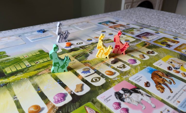 A zoomed in image showing the Walker tokens on their way through the park. The spaces show different resources (toys, balls, treats, points).